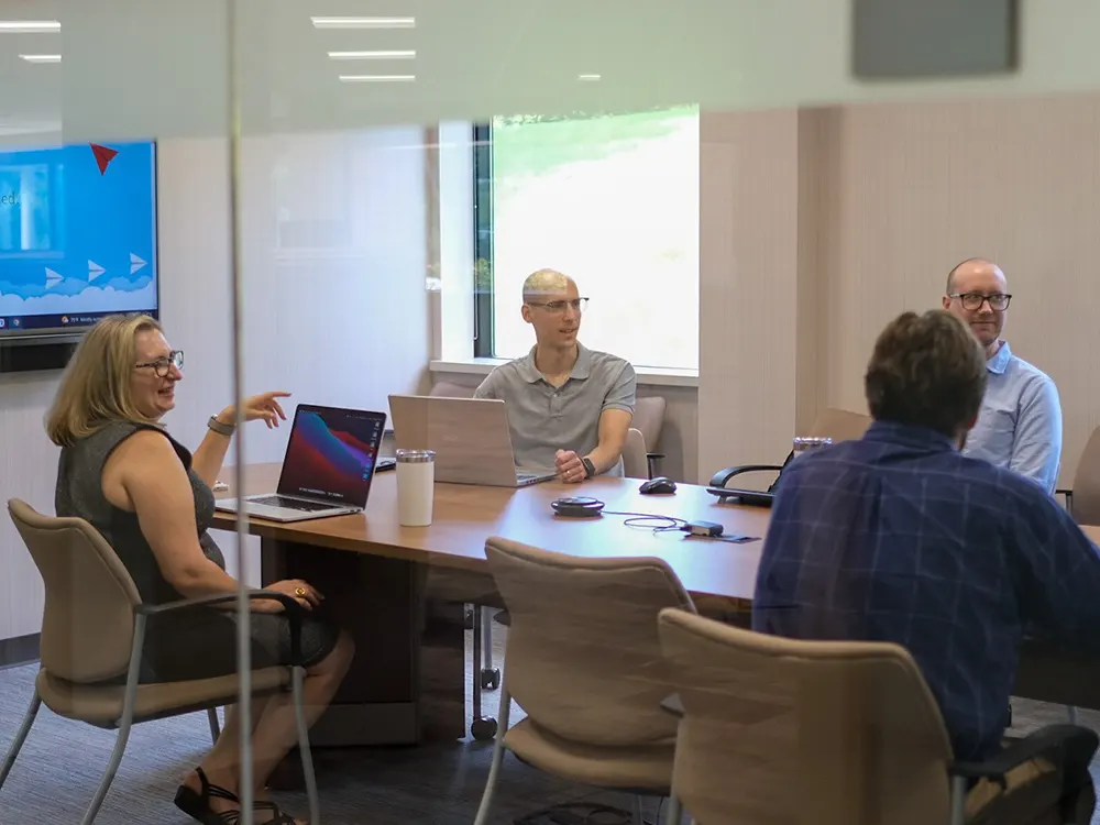 Marketing team having a strategy meeting in a conference room.