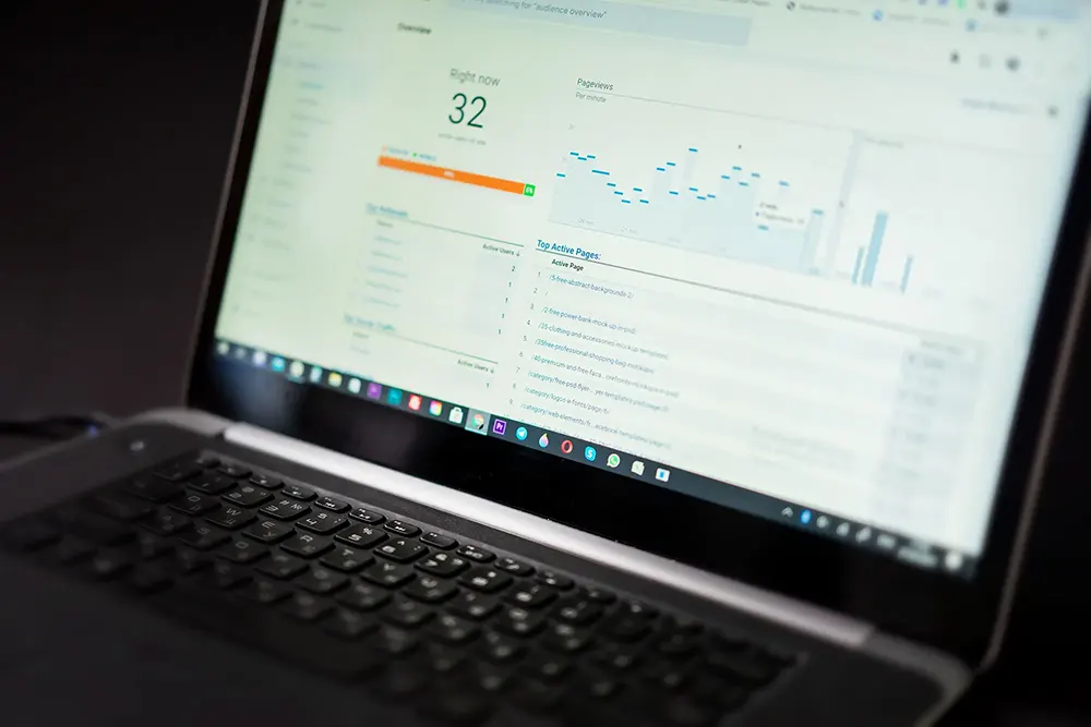 Laptop displaying SEO traffic for web pages.