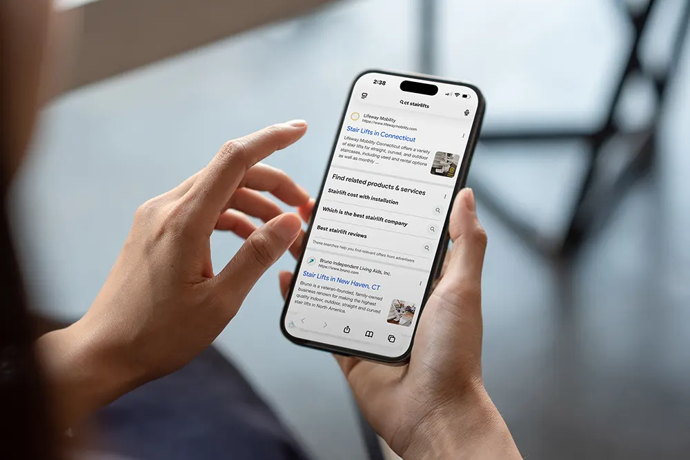 Person viewing Google search SEO ranking results on their smart phone.