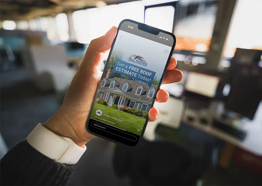Person viewing a social media video ad for a roofing company.