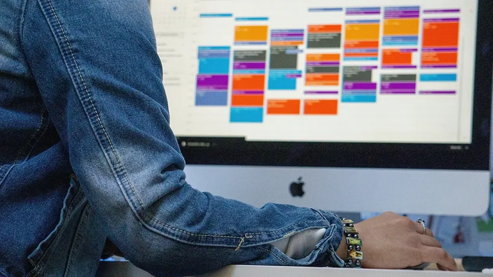 Person developing an email marketing strategy on their computer.