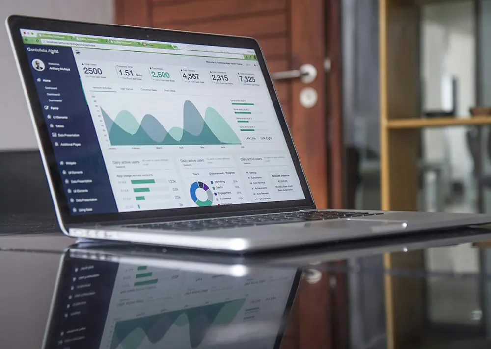 Laptop displaying lead generation data from CRM software.